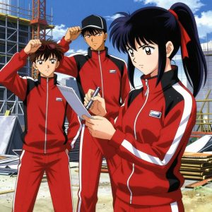 1 anime characters in crimson and black athletic track suits with white stripes down the sleeves calibrating a literal quantum in a construction site with scaffolding and materials stacked against blue sky. All characters wear small reflective silver badges on their chests. One female character has a crimson ribbon tied around her ponytail. One character wears a black cap with a white stripe. One verifies dimensions with a precision tool, comparing to the specification. NO TEXT anywhere in this image — no speech bubbles, no word bubbles, no labels, no signs, no writing of any kind. Anime style, vibrant colors, clean composition, cinematic lighting.